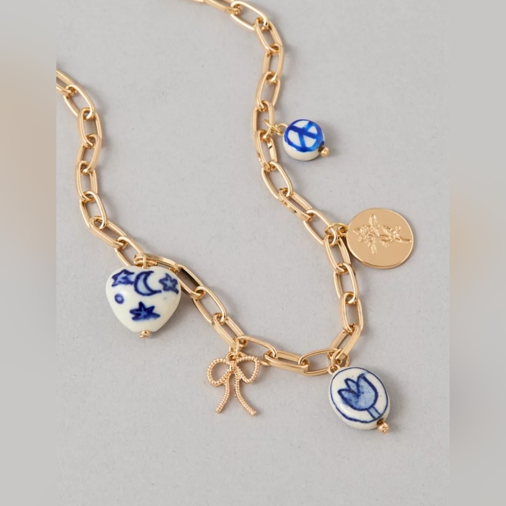 New American Eagle Ae Gold Tone Necklace Blue White Charm Pottery Bow Floral
